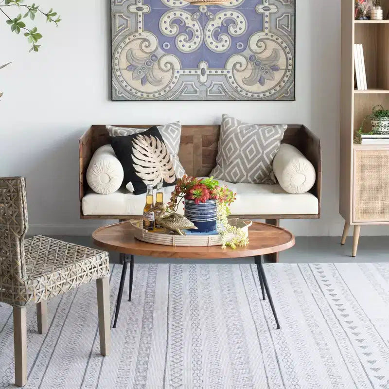 Table basse ovale Noyes en bois d'acacia et fer GDFStudio